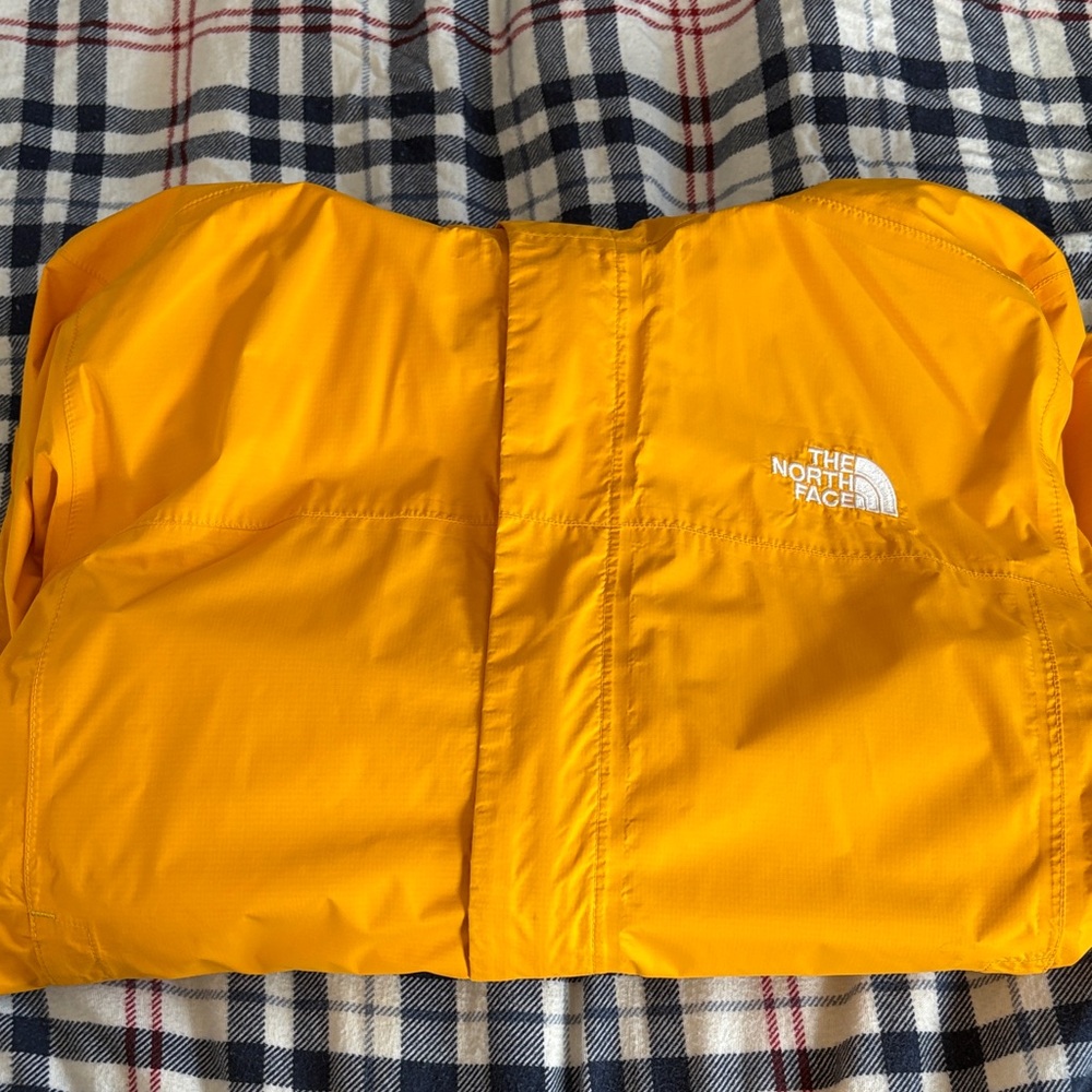 The North Face Vibrant Yellow Outerwear